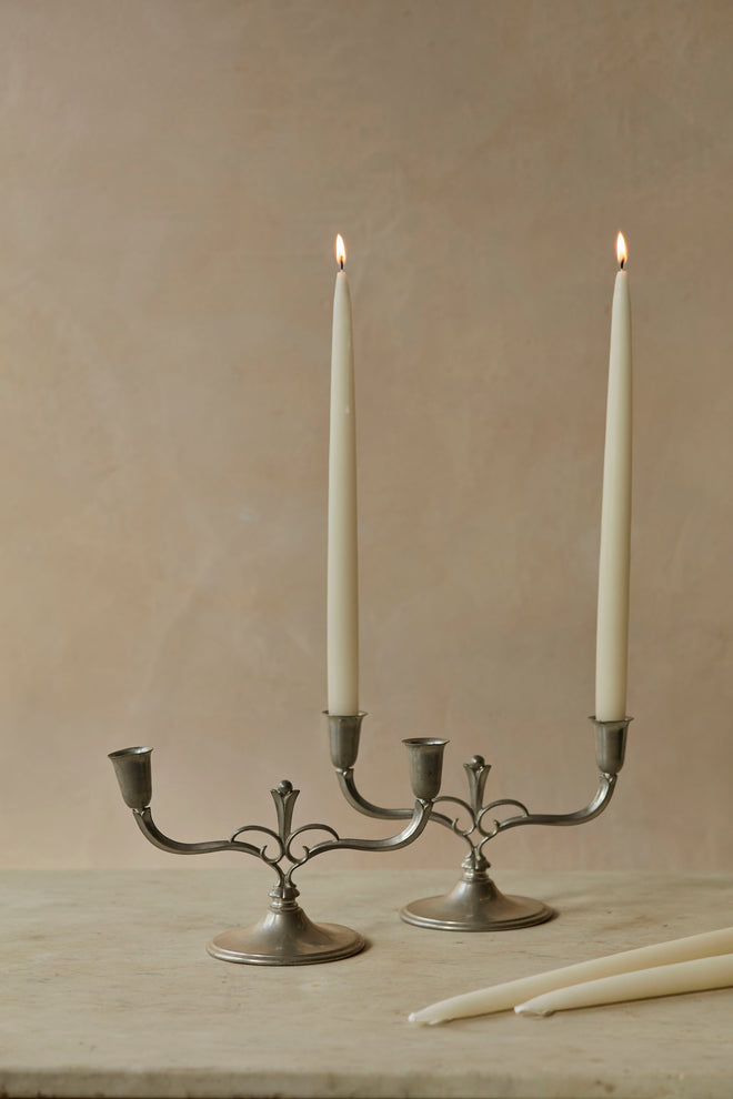 A pair of Swedish pewter candlesticks