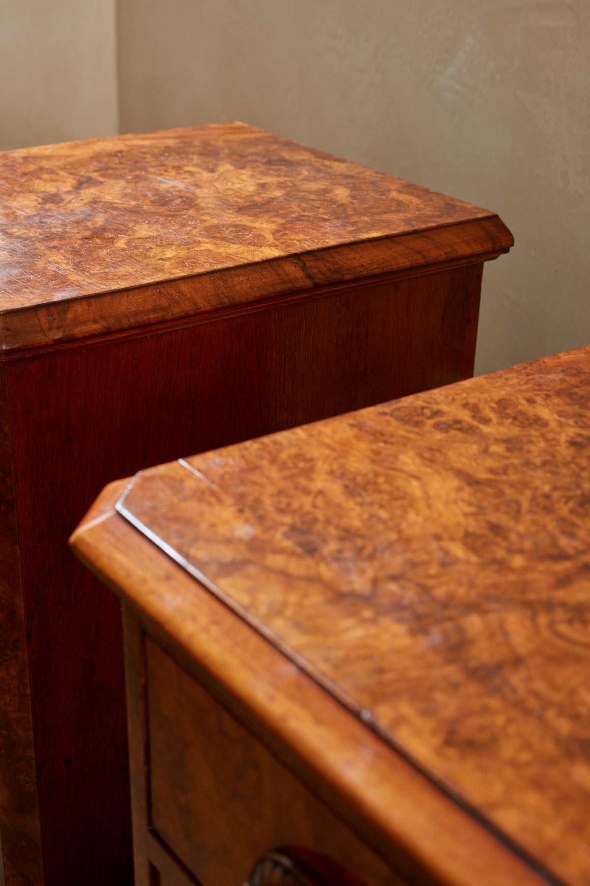 A Pair of Mid Century Burr Bedside Tables