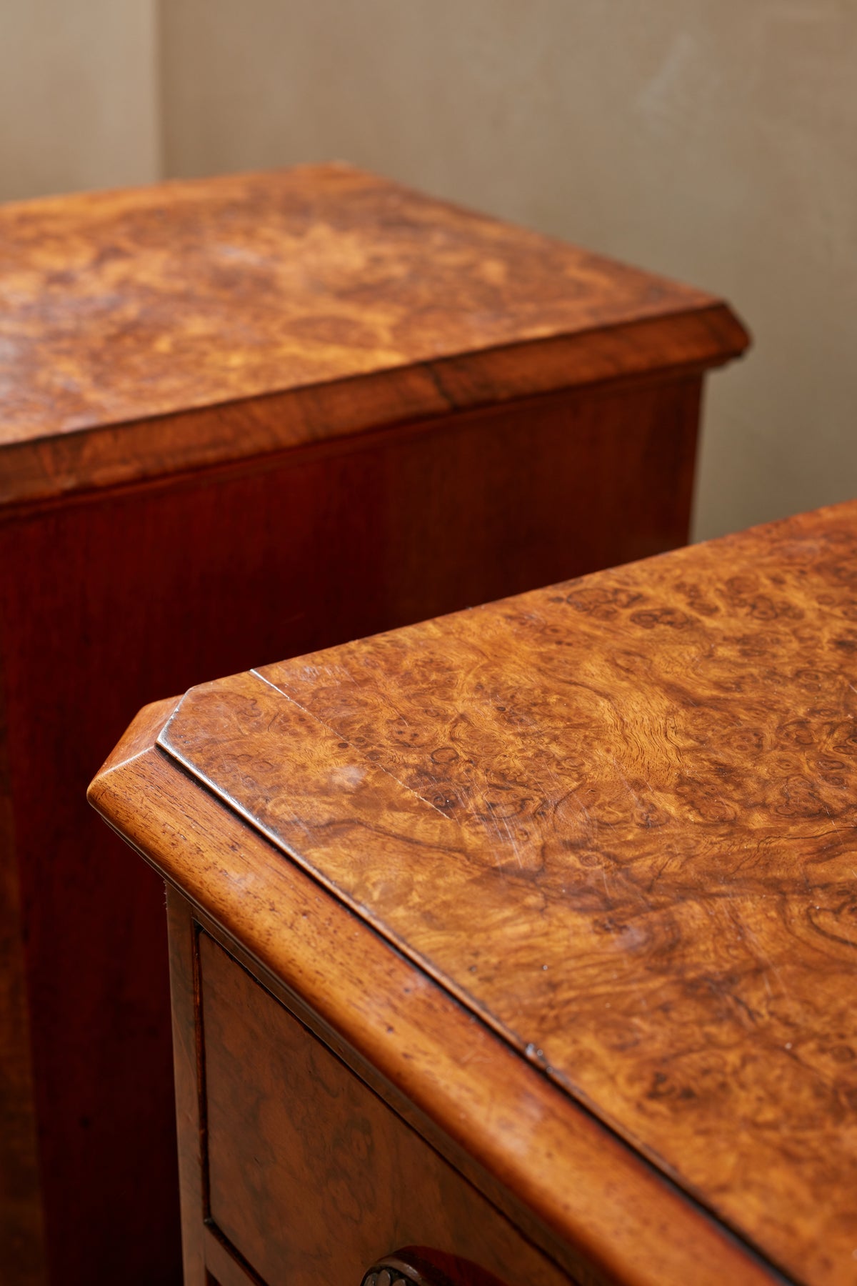 A Pair of Mid Century Burr Bedside Tables