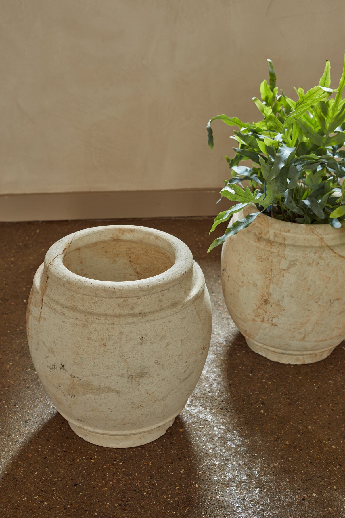 A Pair of Italian Carved Stone Mid Century "Cache Pots"