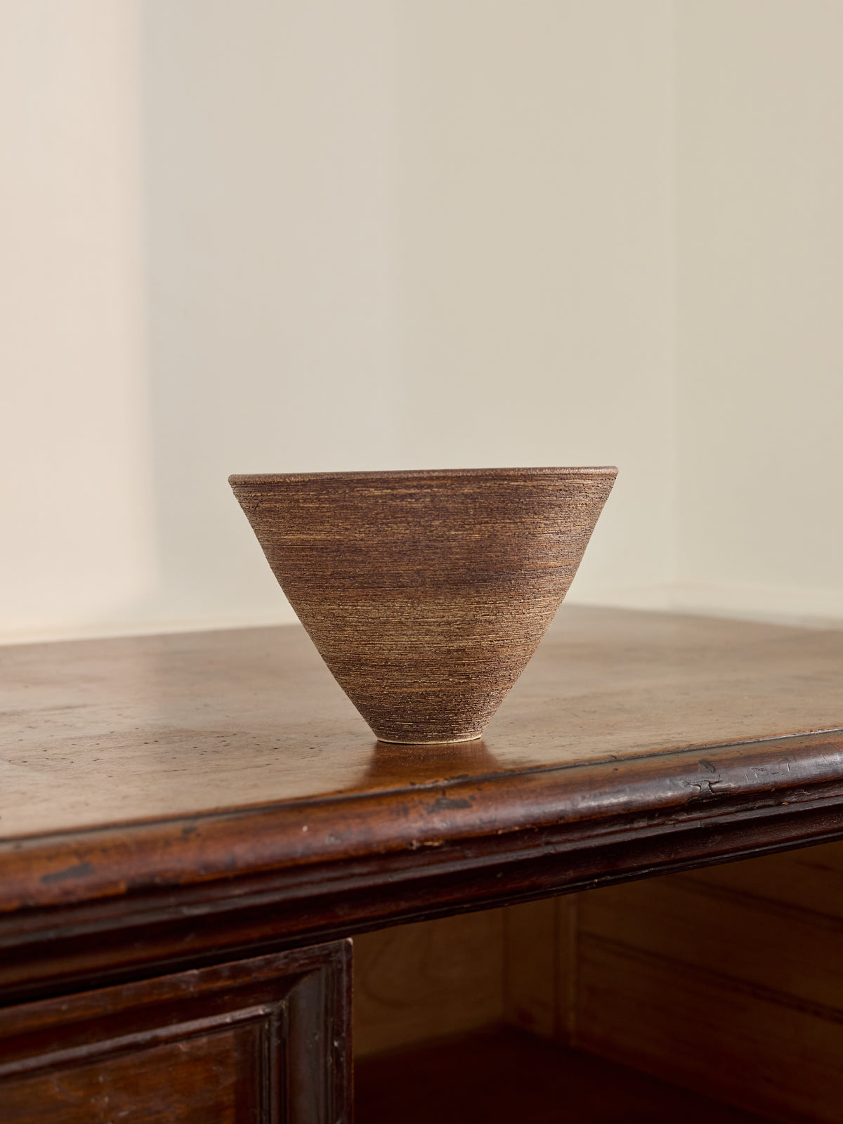 A Fluted Ceramic Bowl with Red Glazed Interior