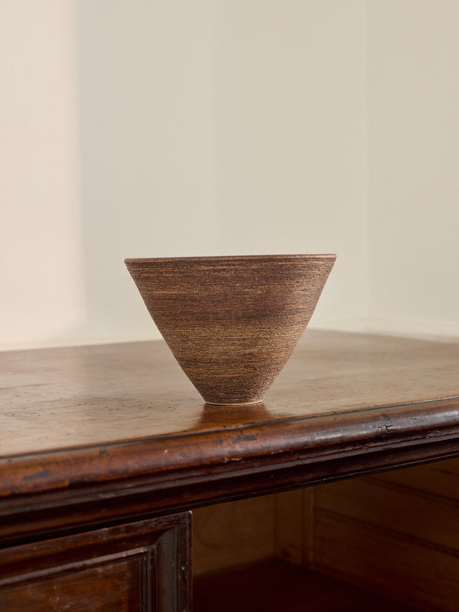 A Fluted Ceramic Bowl with Red Glazed Interior