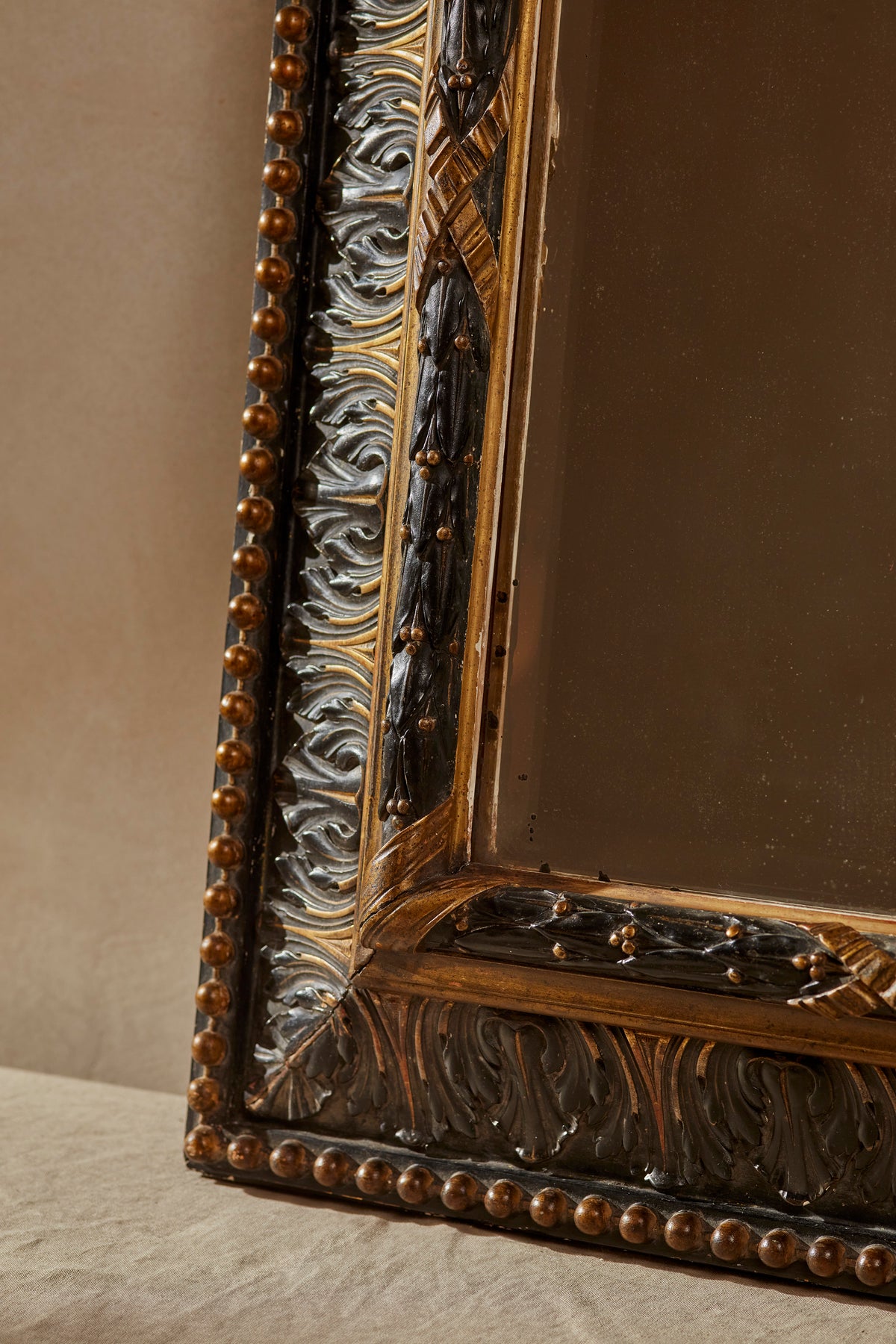 Carved 20th Century Ebonised & Gilt Mirror