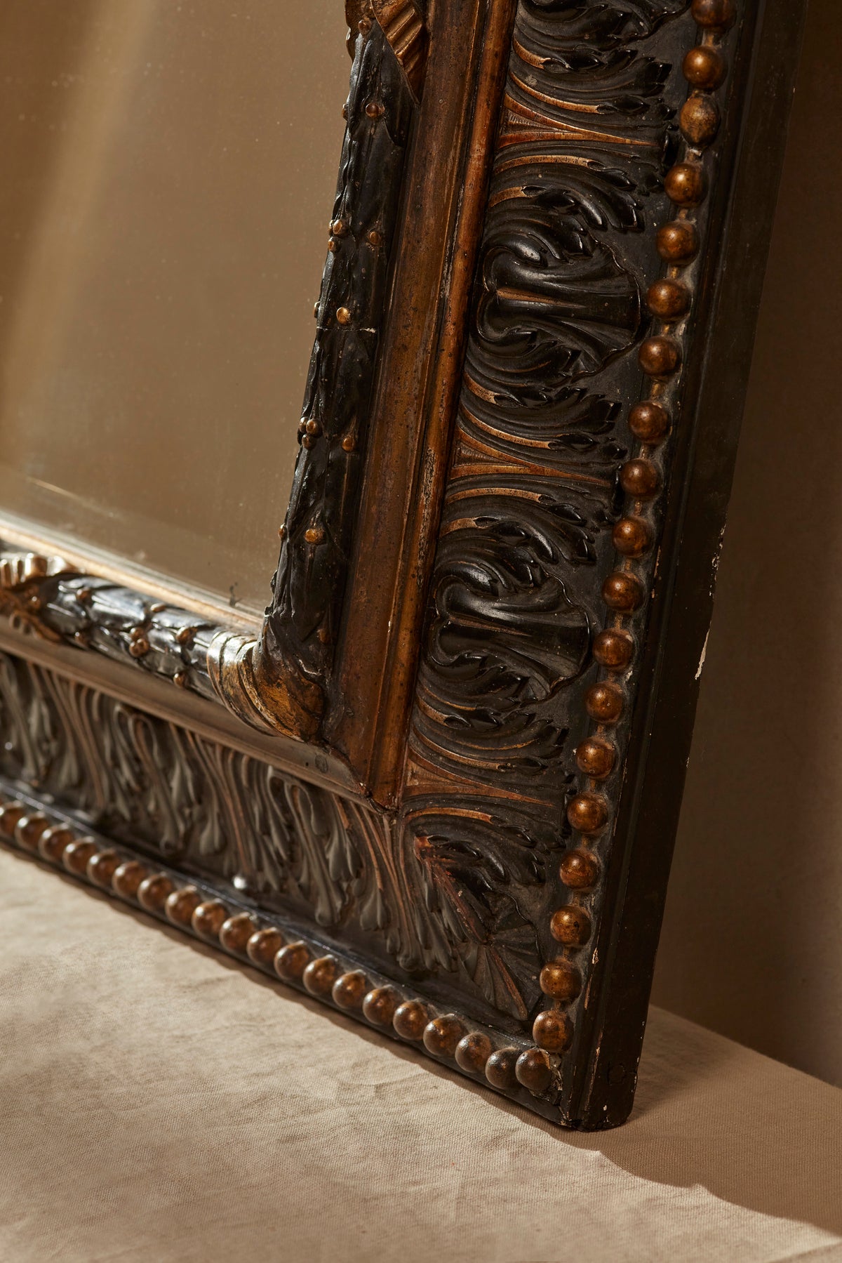 Carved 20th Century Ebonised & Gilt Mirror