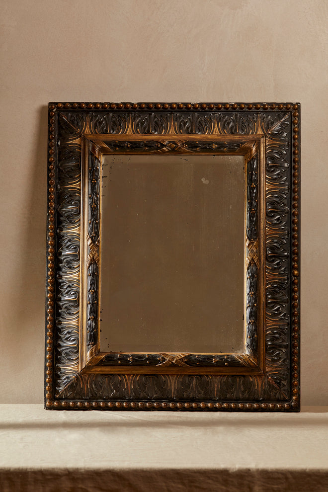 Carved 20th Century Ebonised & Gilt Mirror