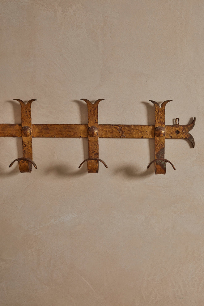 A Hammered Gilt Iron Coat Hook