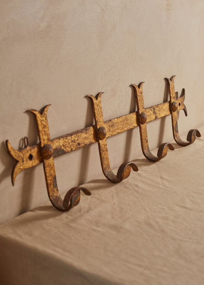 A Hammered Gilt Iron Coat Hook