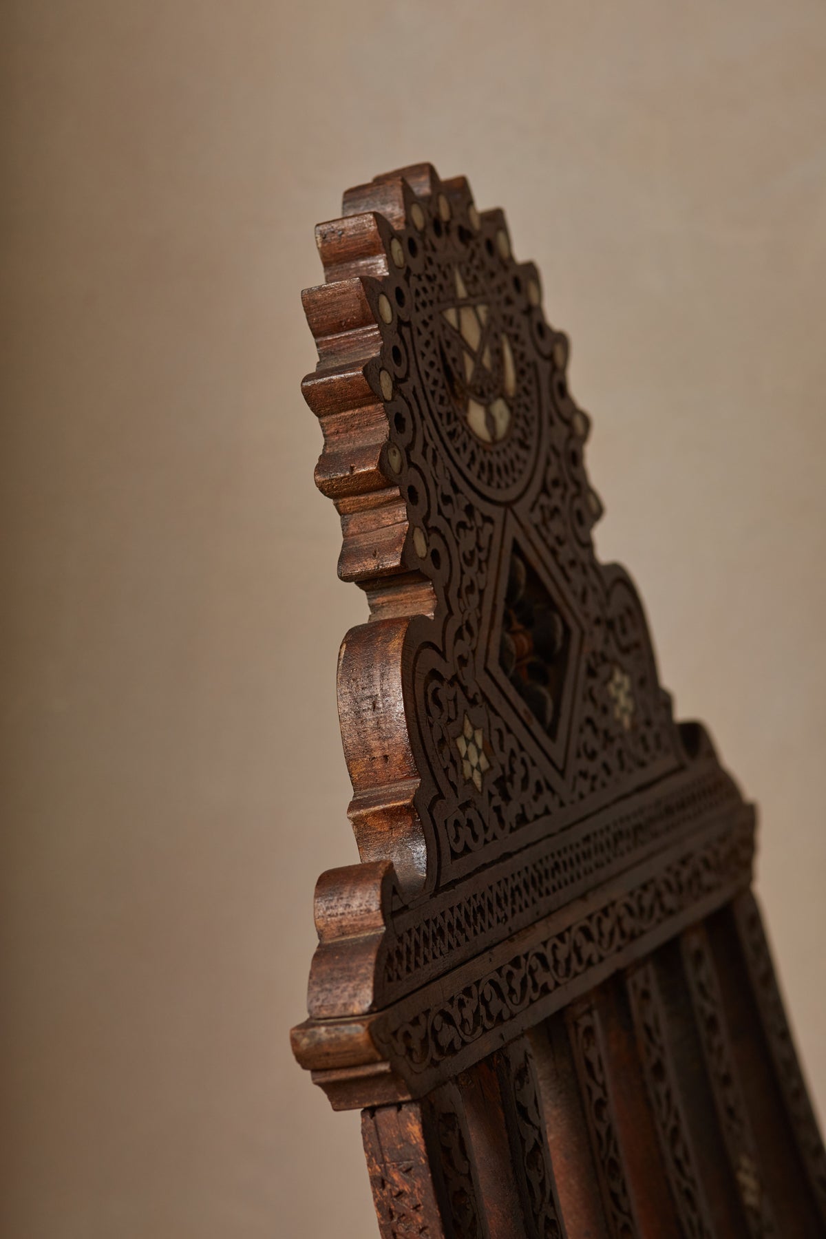 A Sculptural Inlaid Islamic Marriage Chair