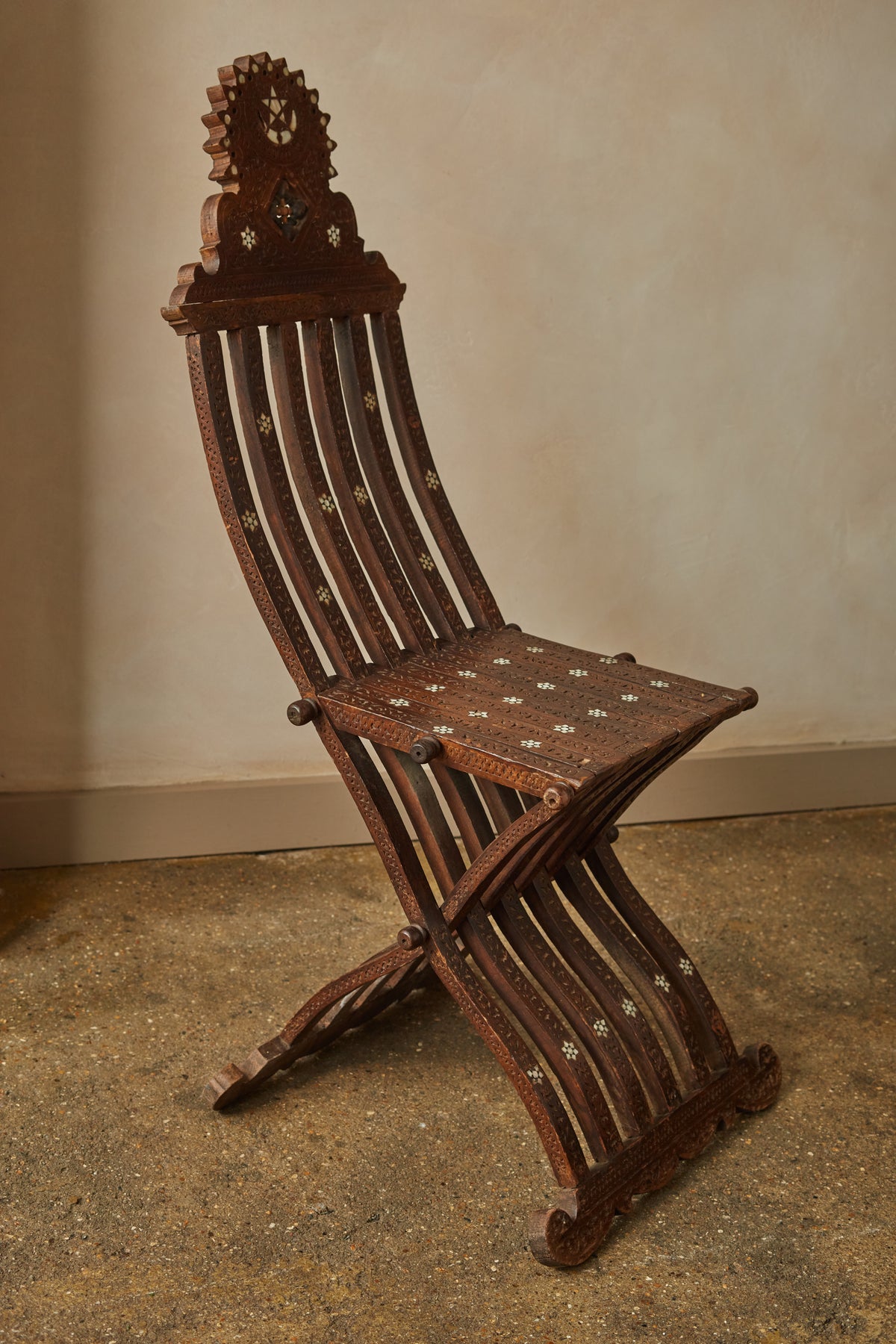A Sculptural Inlaid Islamic Marriage Chair
