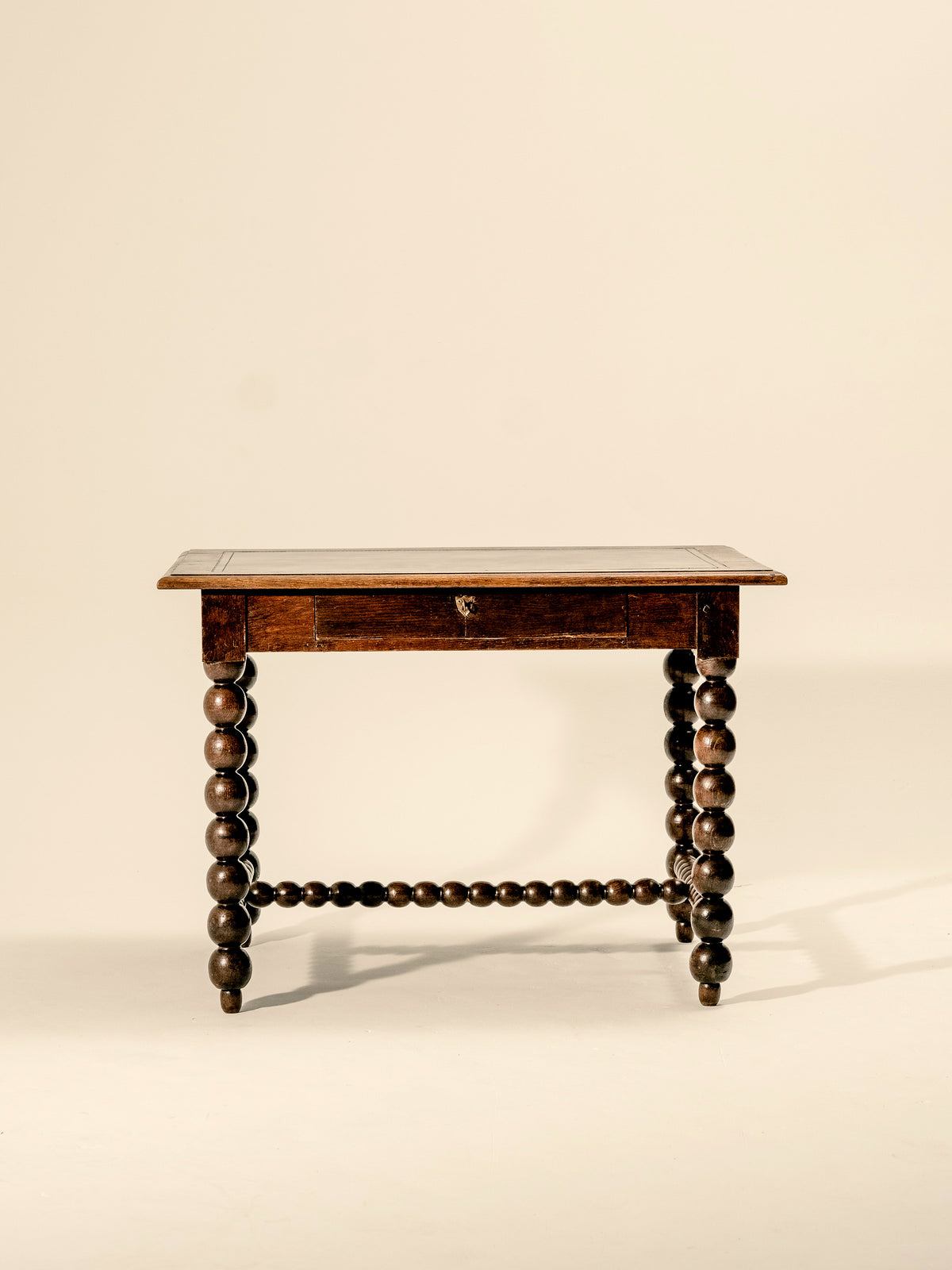 An Oak Louis XIII Bobbin Legged Desk