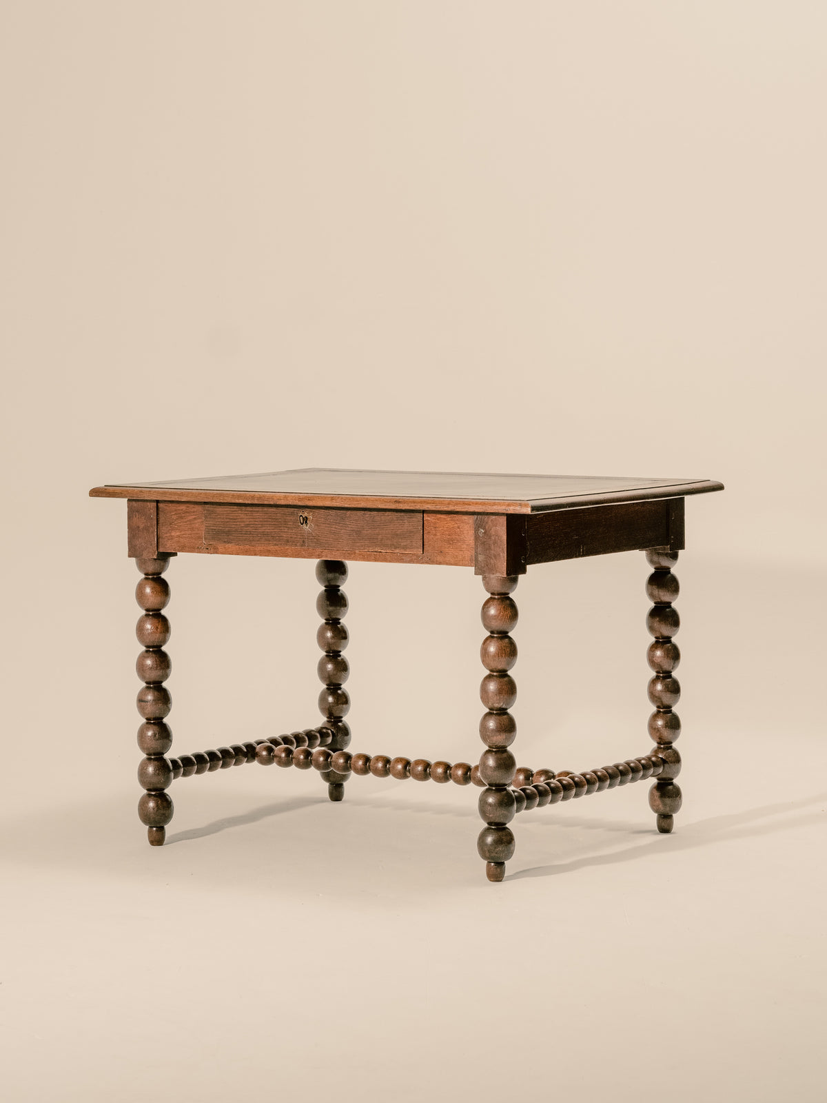 An Oak Louis XIII Bobbin Legged Desk