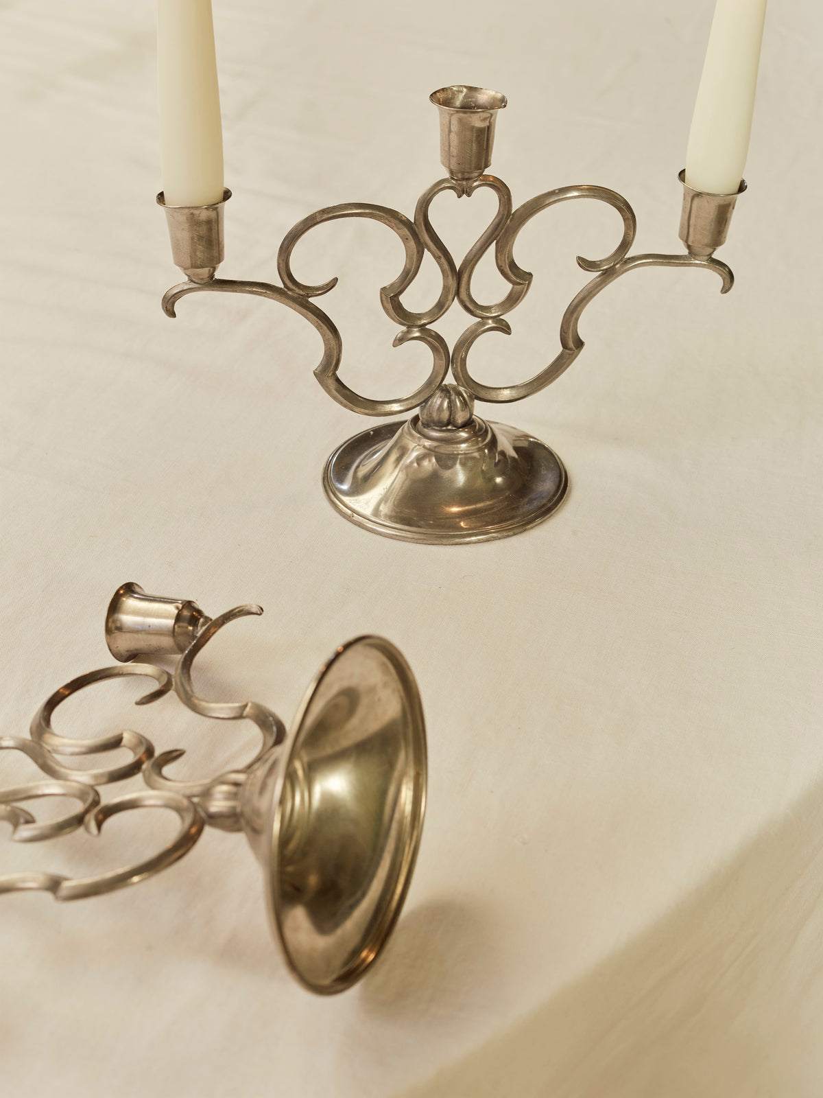 A Pair of Elegant, Double Armed Candlesticks for Svenskt Tenn