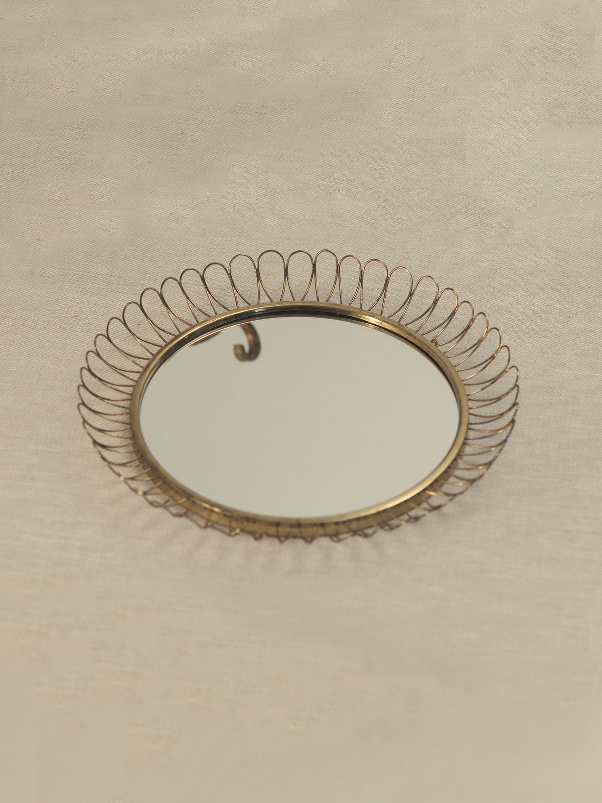 Small Brass Mirror With Squiggle Motif